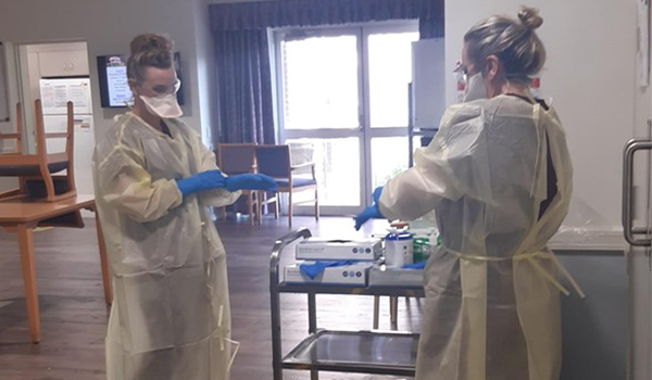 This is the CEO and COO of Southern Cross Care (NSW & ACT) working on the floor