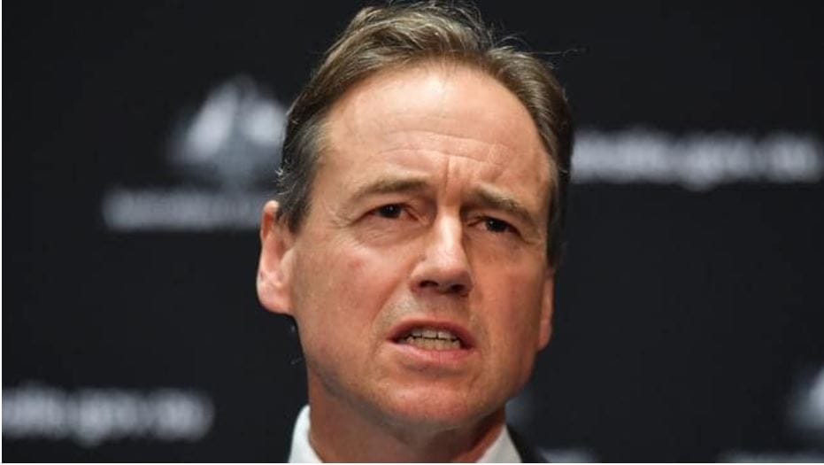 Greg Hunt says COVID positive aged care residents must be admitted to hospital, as doctors warn of ‘bed blockers’ filling wards to capacity post image